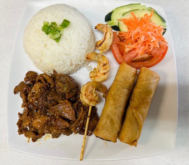 Grilled Pork, Shrimp,egg Rolls with Rice.
